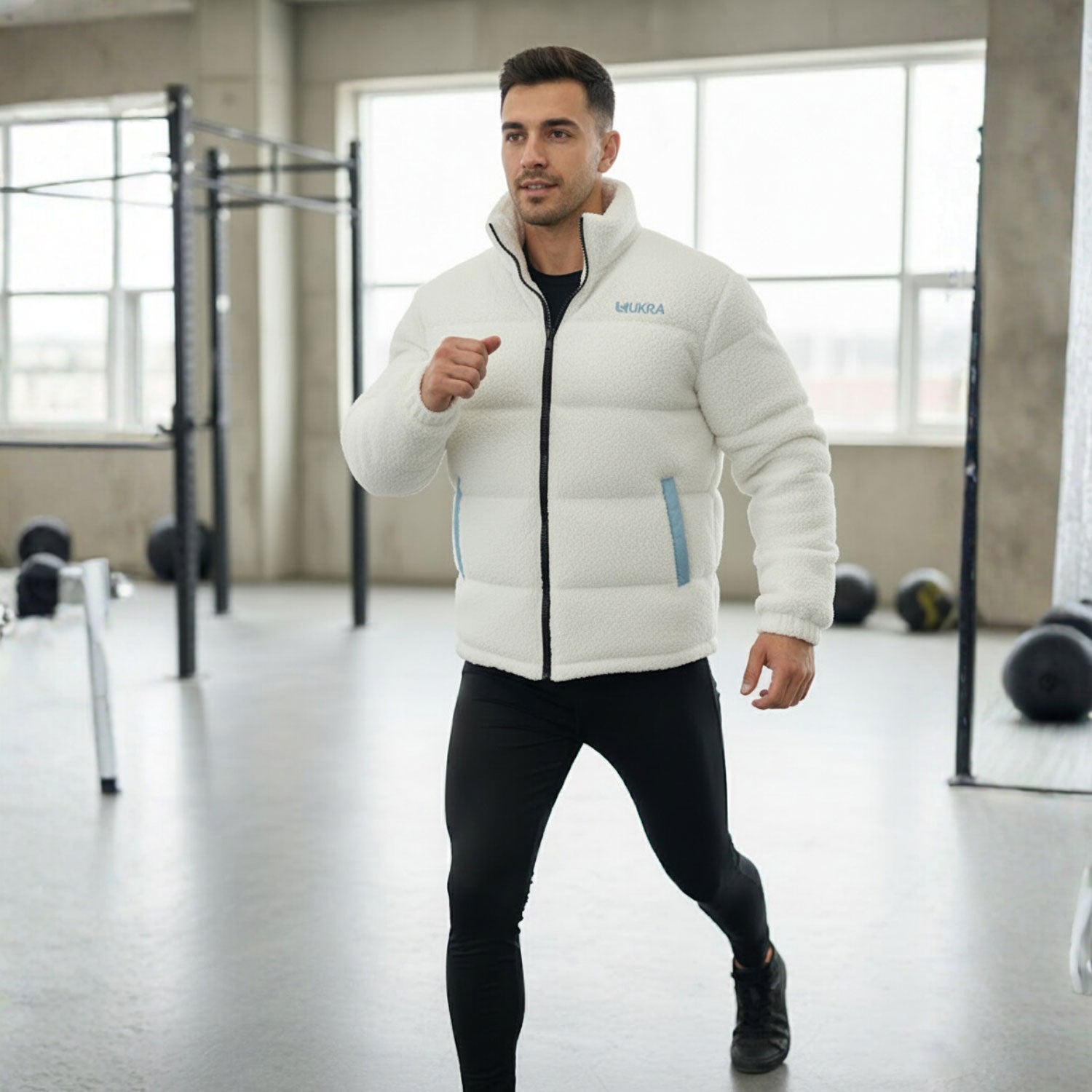 White sheep side of UKRA Reversible Jacket for men.